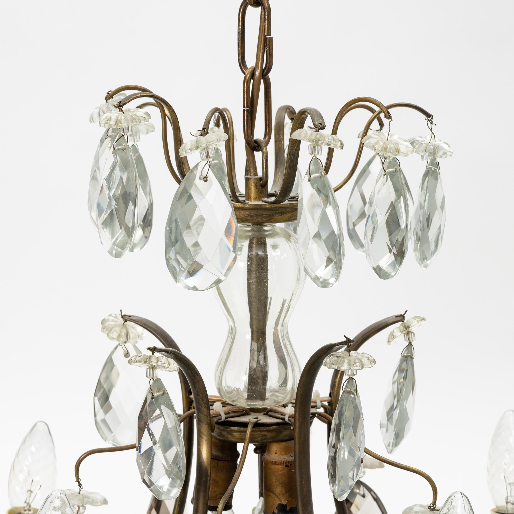 Takkrona, rokokostil, 1900-talets första hälft.