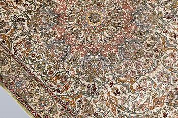 An Oriental silk rug, approx. 153 x 95 cm.
