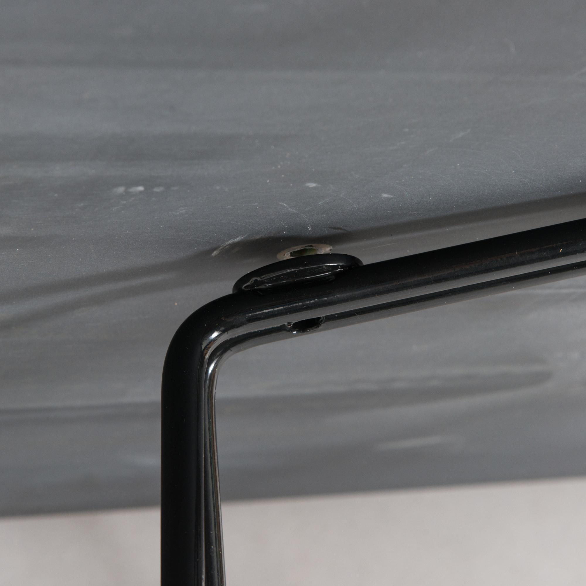 Lella and Massimo Vignelli, A "Paperclip" table in slate from Knoll 1994.