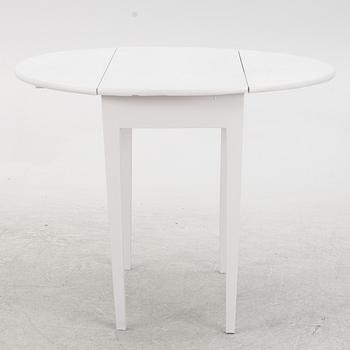 A drop-leaf table, late 19th Century.