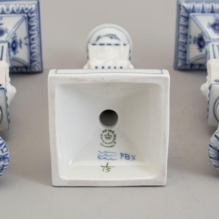 Two pairs of porcelain candlesticks by Royal Copenhagen, Denmark, third quarter of the 20th century.