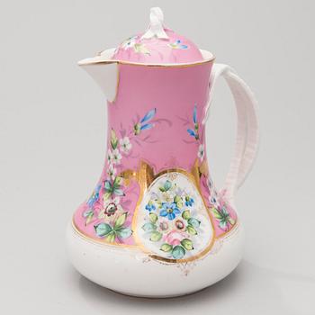 A RUSSIAN PORCELAIN COFFEE POT, Kusnetsov porcelain factory late 19th century.