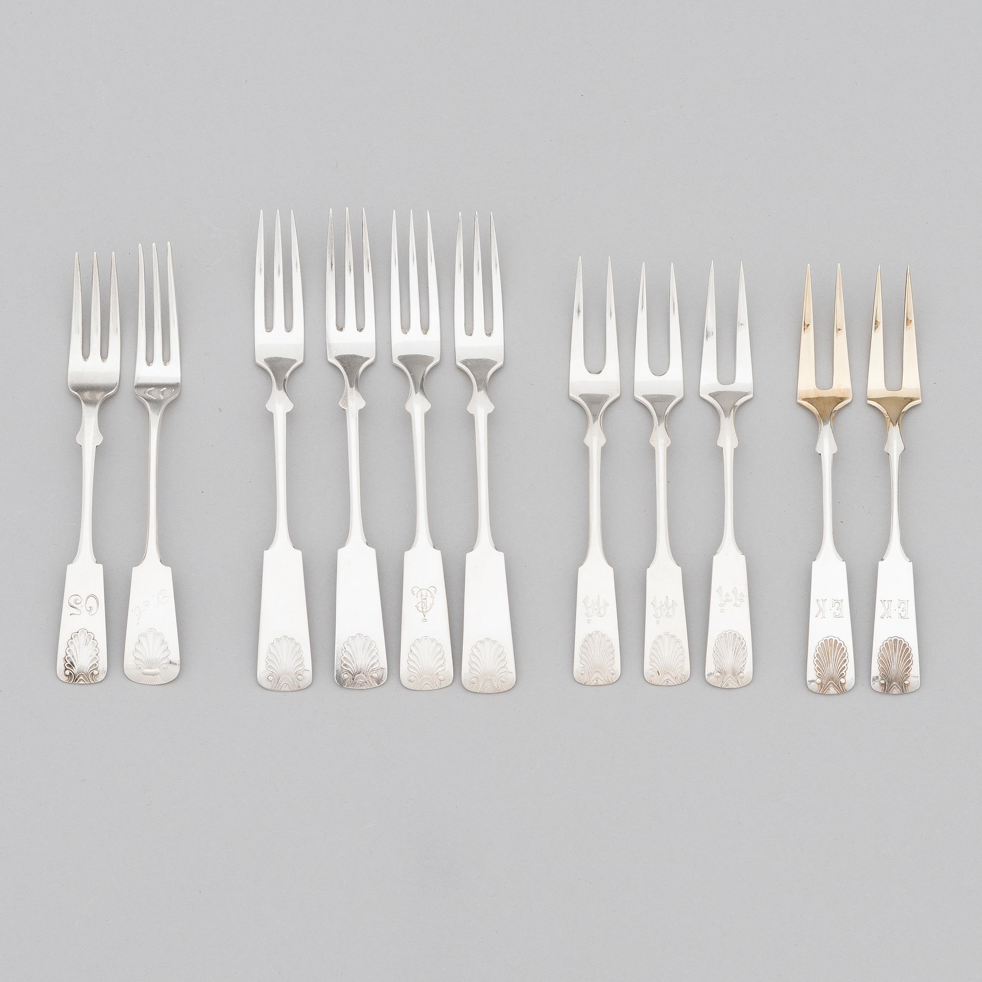 A 42-piece set of silver cutlery with seashell decorated handles, Finnish hallmarks, 1918-1950.