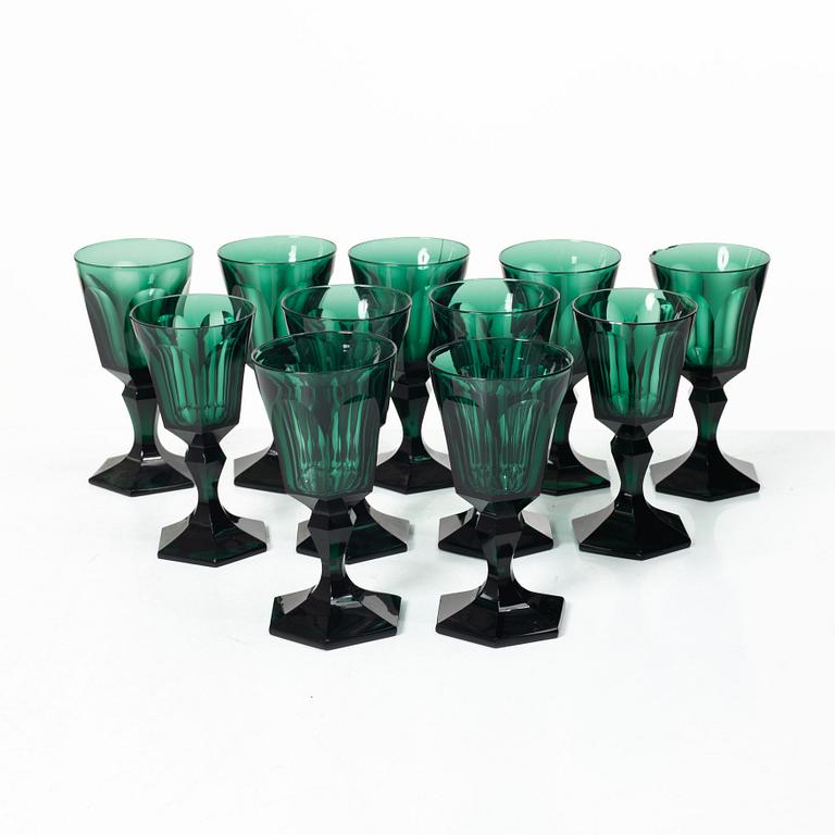 Eleven white wine glasses, green, 19th century.