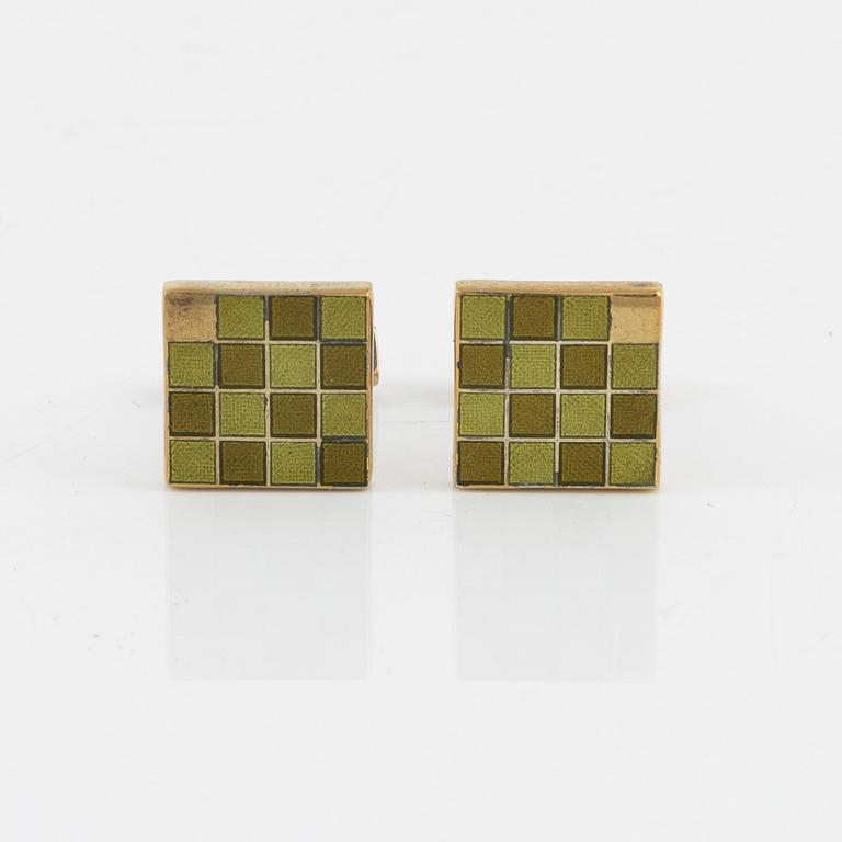 Louis Vuitton, a pair of gold plated silver cufflinks.