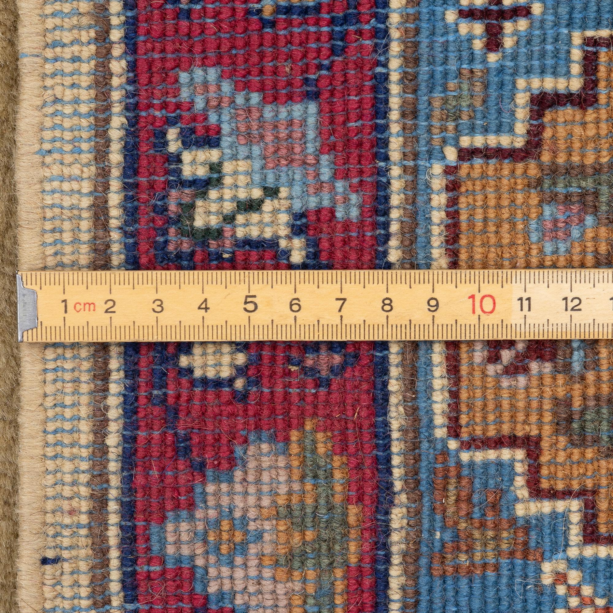 A 'Karistan' carpet, Romania, 275 x 182 cm.