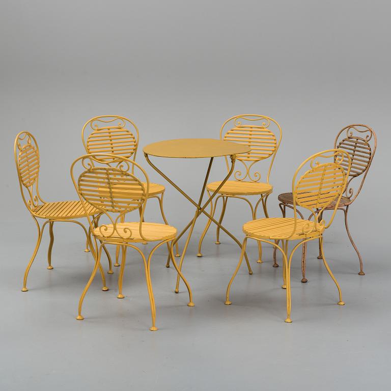 A set of six garden chairs and a table, (7parts), chairs signed Skoglund & Olson Gefle. Ca 1900.