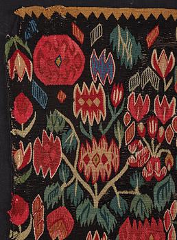 A carrige cushion fragment, 'Blomstermosaik', tapesty weave, c 61 x 48 cm, Scania, around the year 1800.