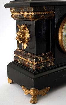 A 19th century table clock by New Haven Clock Co in New Haven, USA.