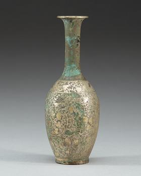 A silvered metal vase, presumably Tang dynasty.
