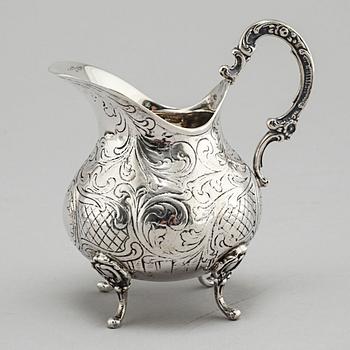 A silver sugarbowl, a cream jug and a tray by J L Hultman, Stockholm, mid 20th century.