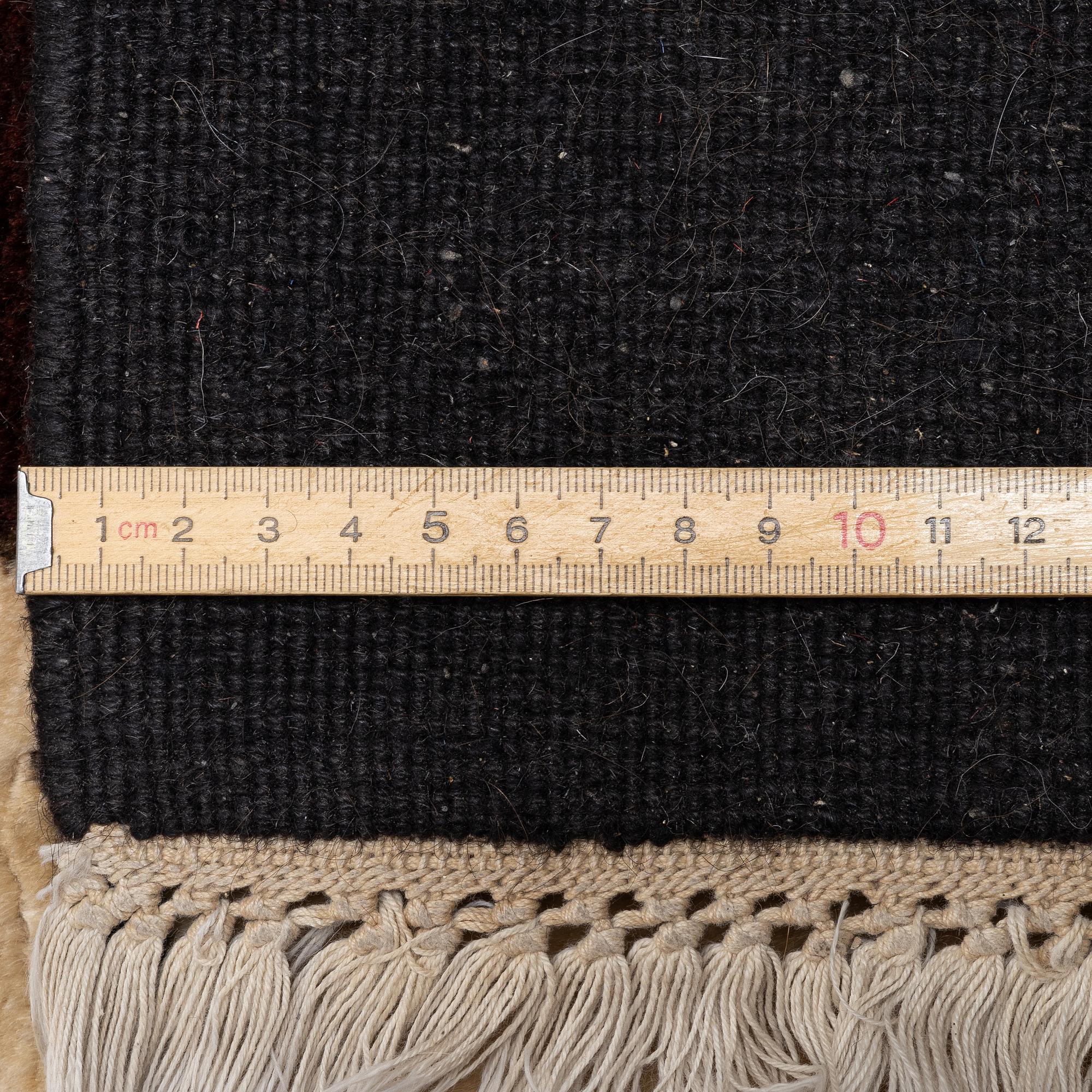 A carpet, c. 460 x 370 cm.