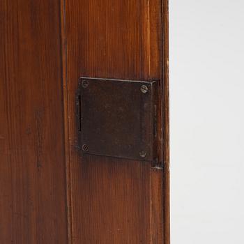 A Gustavian style pinewood corner cupboard, 19th Century.