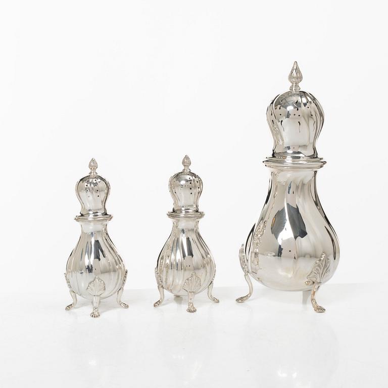 Sugar caster and salt and pepper shakers, silver, marked C.G. Hallberg, including Stockholm 1948.