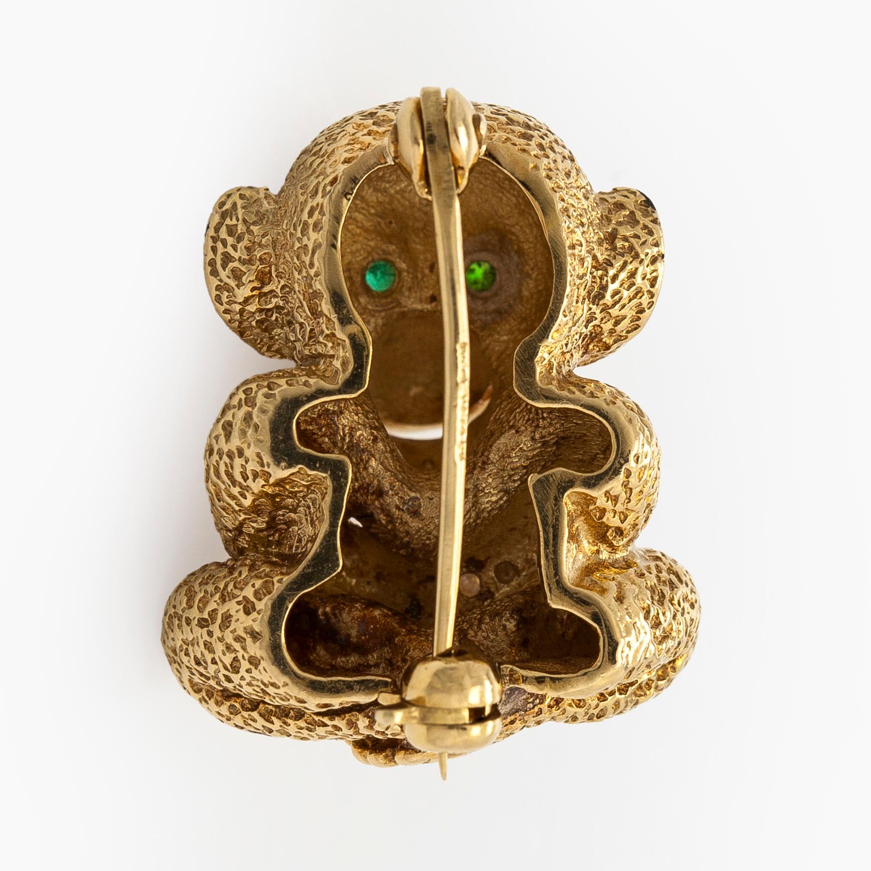 Brooch, 18K gold, diamond and emeralds.