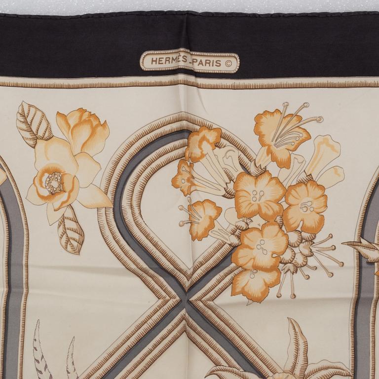 Hermès, a 'Caraibes' silk scarf.