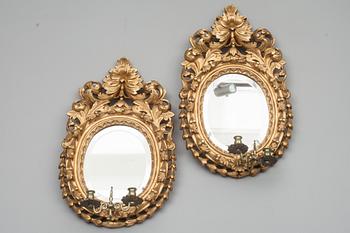 SPEGELLAMPETTER, ett par, barockstil. 1800-tal.