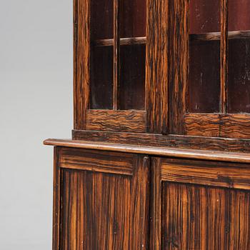 A Swedish faux-boix neo-gothic book cabinet, ca 1830.
