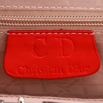 CHRISTIAN DIOR, a red patent leather handbag.