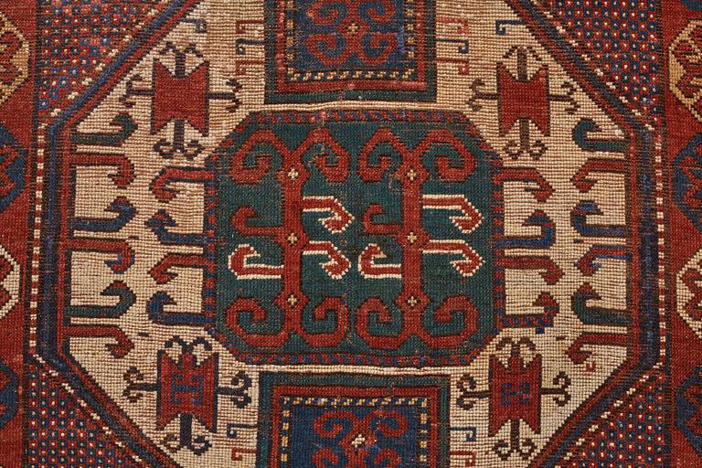 MATTO, an antique/semi-antique Karachop Kazak, ca 226 x 167,5 cm.