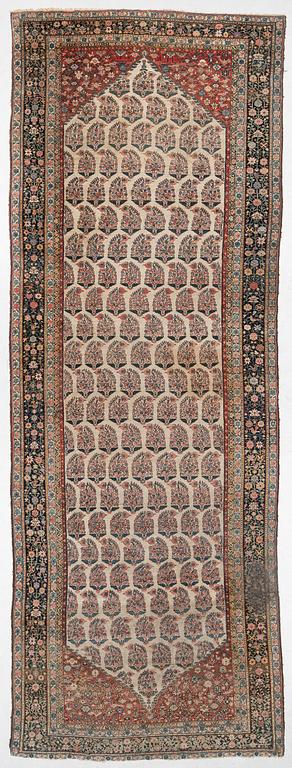 A Bakhtiari carpet, signed, c. 580 x 212 cm.