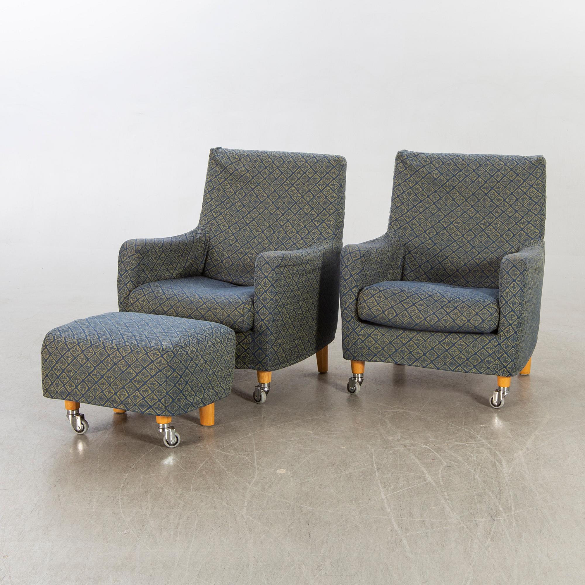 Erik Jörgensen,  a pair of armchairs and a stool, later part of the 20th century.