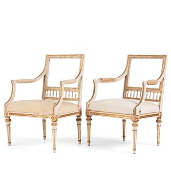 A pair of Gustavian open armchairs by J. Lindgren (master in Stockholm 1770-1800).