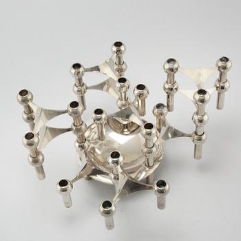 A metal candlestick with eleven parts by Ceasar Stoffi and Fritz Nagel, second half of the 20th century.