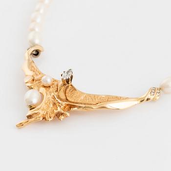 Cultured freshwater pearl necklace, with navette cut diamond and brilliant cut diamonds.