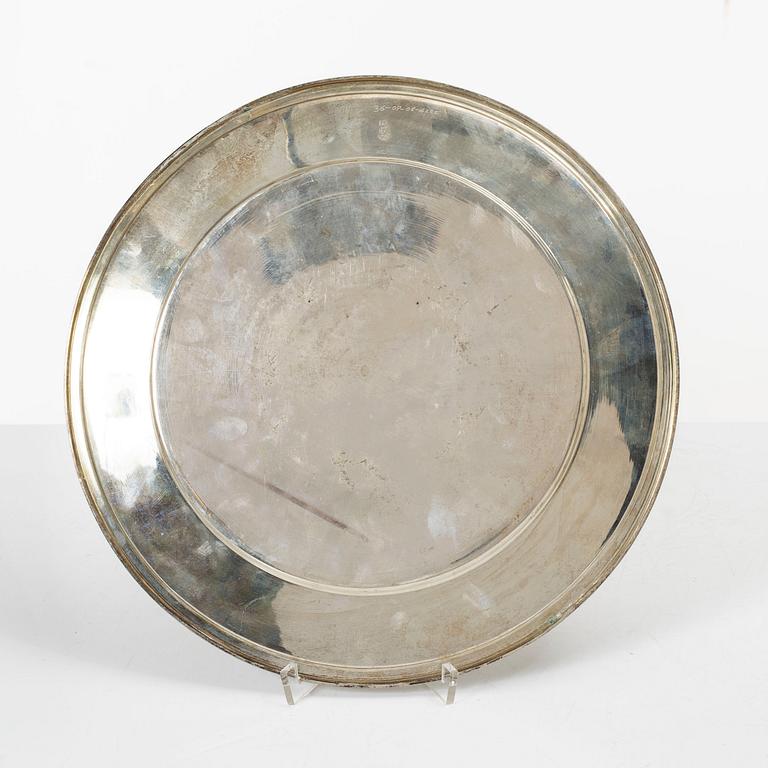 A pair of Persian silver plates, 20th century.