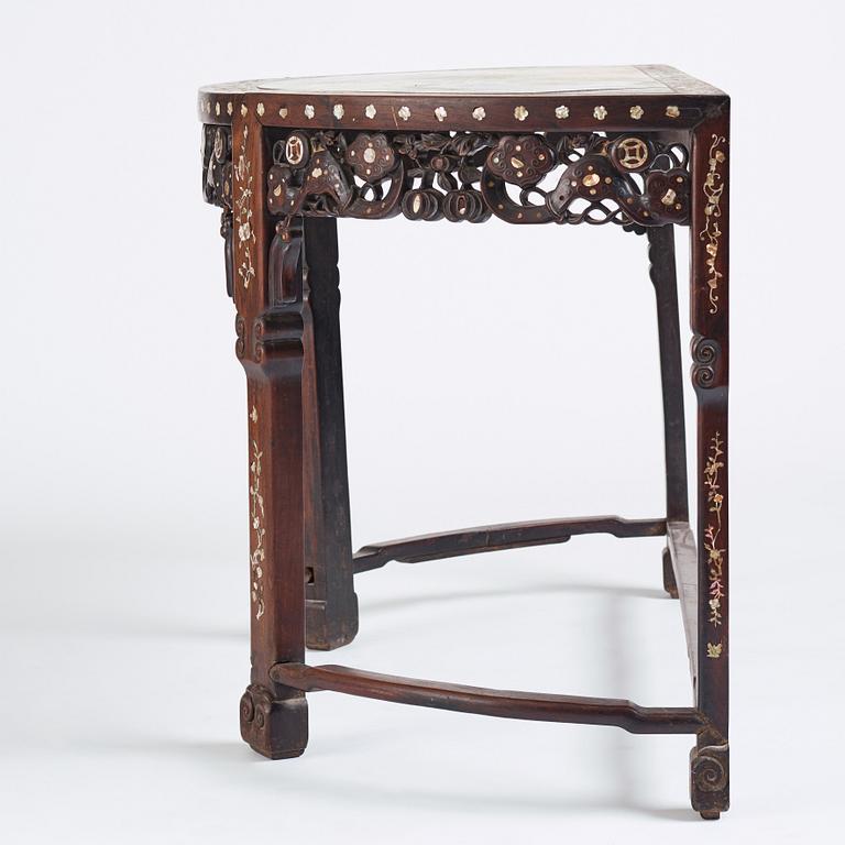 A Chinese hardwood demi-lune side table with mother-of-pearl inlays, late Qing dynasty.