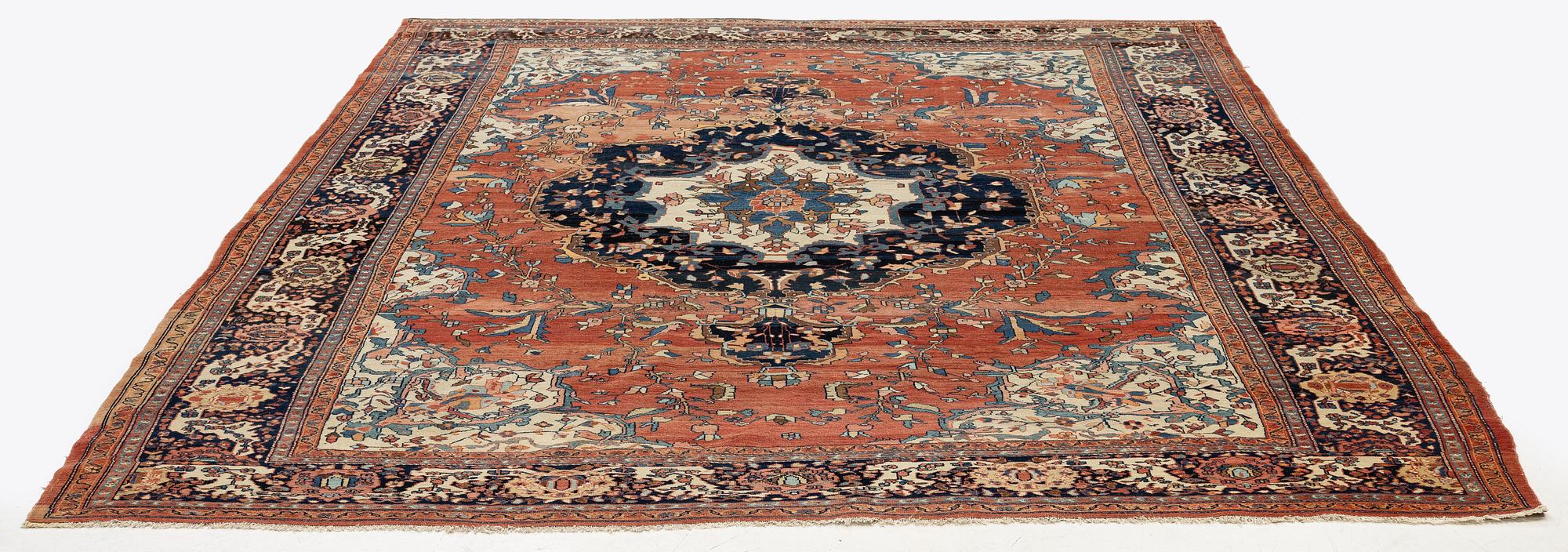 An Antique Sarouk carpet, West Persia, c. 353 x 260 cm.
