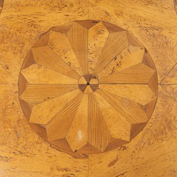 An inlay table, 19th Century.