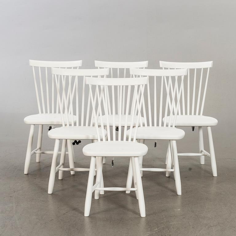 Six white 'Lilla Åland' chairs by Carl Malmsten, Stolab Sweden.