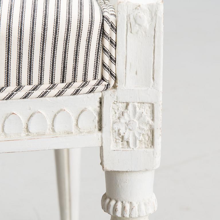 A late 18th century Swedidh Gustavian open arm chair.