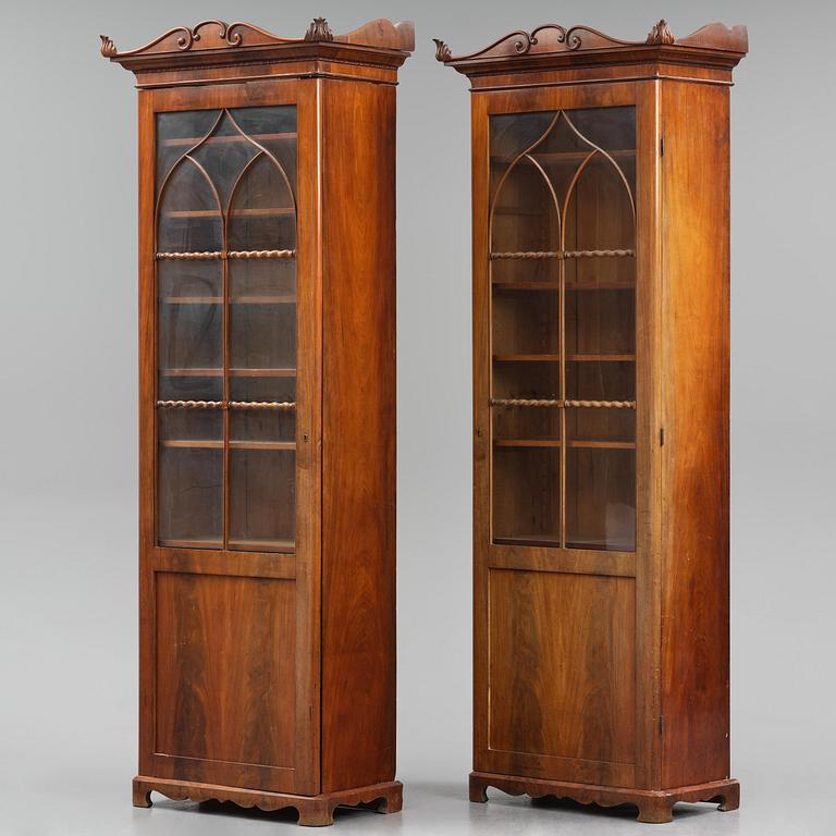 A pair of late Empire mahogany book cabinets, Stockholm, 1820/30's.