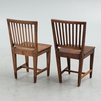 A provincial dining table and eight similar chairs, Sweden, 19th century.