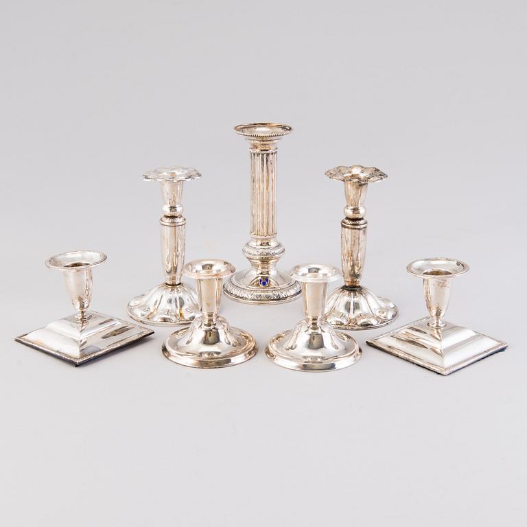 Seven silver candlesticks, Finnish hallmarks 1957-2002.