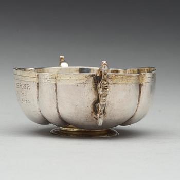 A German 17th century parcel-gilt silver brandy-bowl, unmarked, dated 1636.