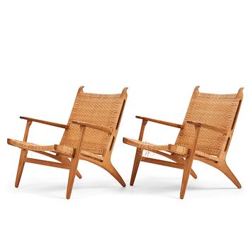 Hans J. Wegner, a pair of oak and rattan 'CH27' chairs, Carl Hansen & Søn, Odense Denmark 1950s-1960s.