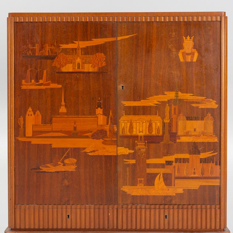 Erik Mattsson, cabinet, "Stockholm,"  executed by Birger Ekman, Mjölby Intarsia for AB Harry Carlsson Stockholm 1940s.