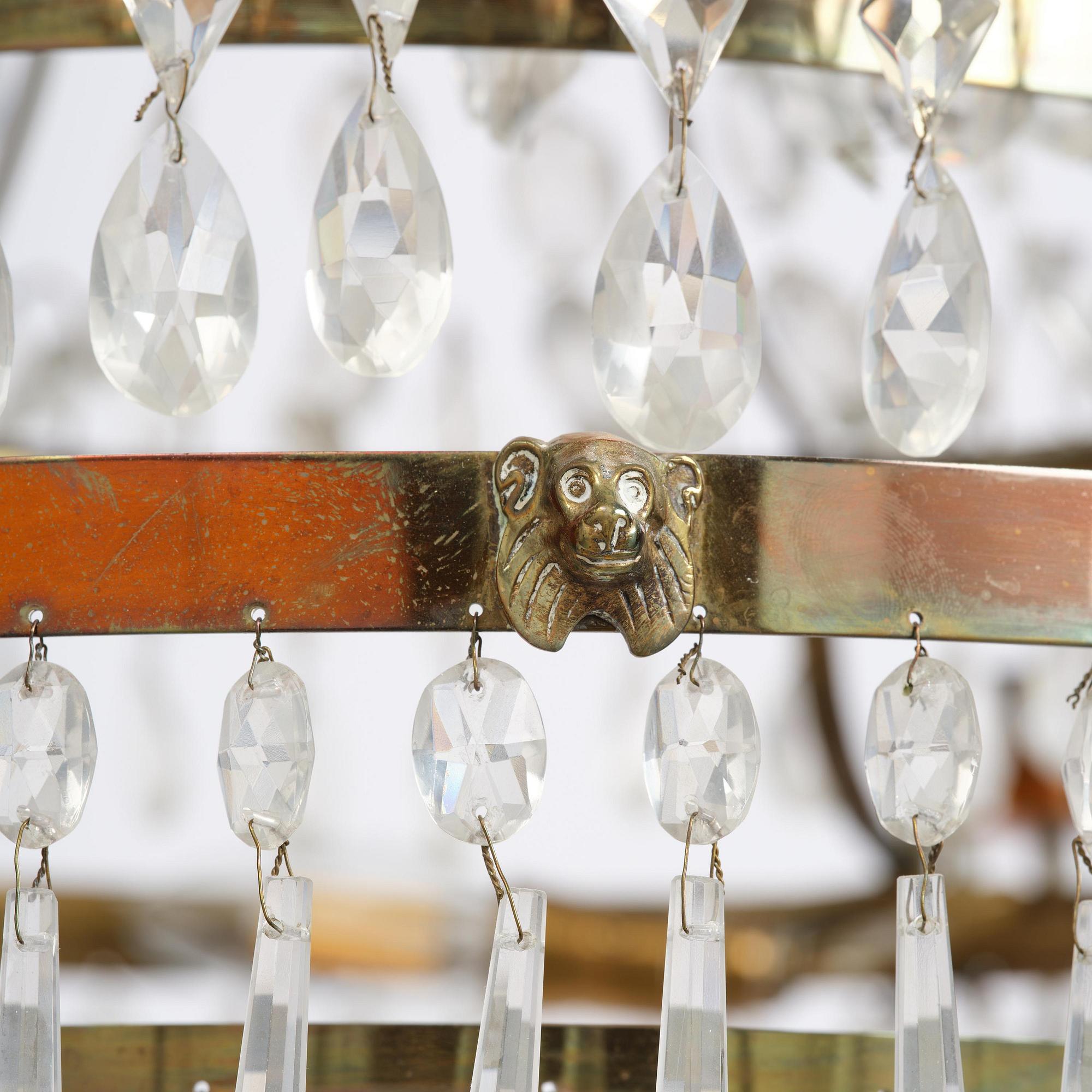 A late Gustavian gilt brass and cut glass seven-light chandelier, circa 1800.