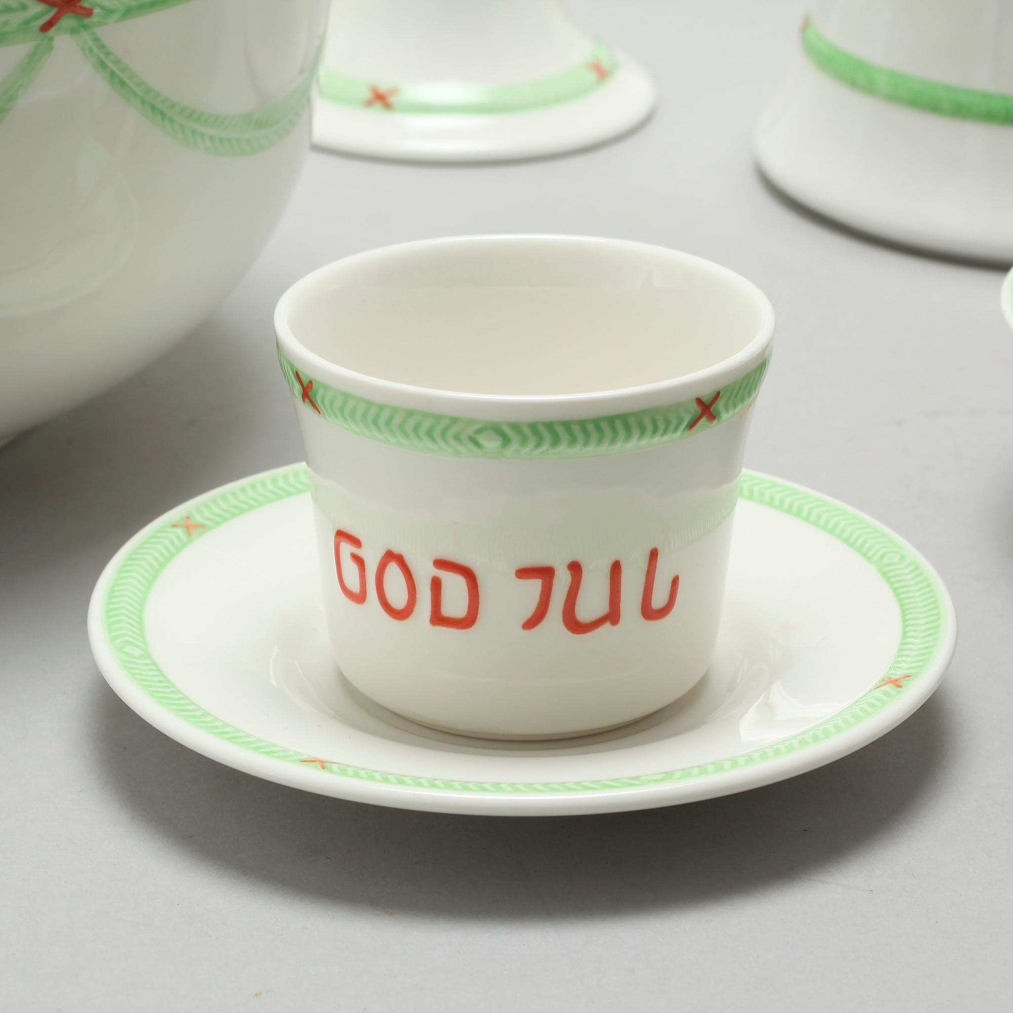 A christmas porcelian tableware set of 37 pcs by Rörstrand from the latter half of the 20th century.