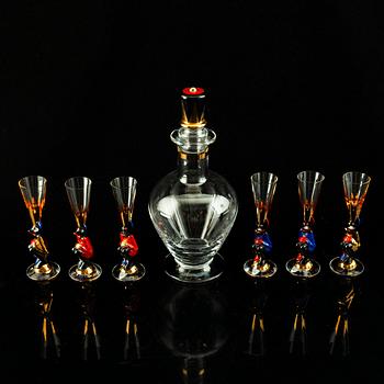 Gunnar Cyrén, a set of six "Devil" shot glasses and a decanter from the "Nobel" series, Orrefors Sweden post 1996.