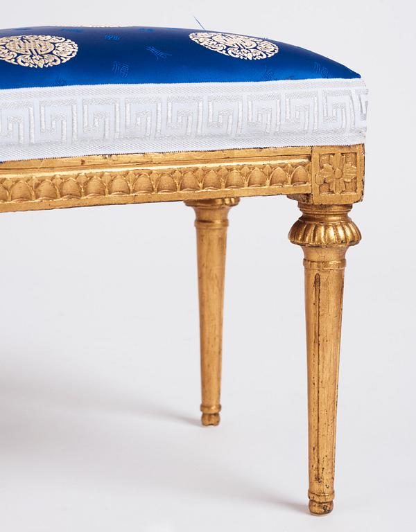 A pair of late Gustavian giltwood stools, late 18th century.