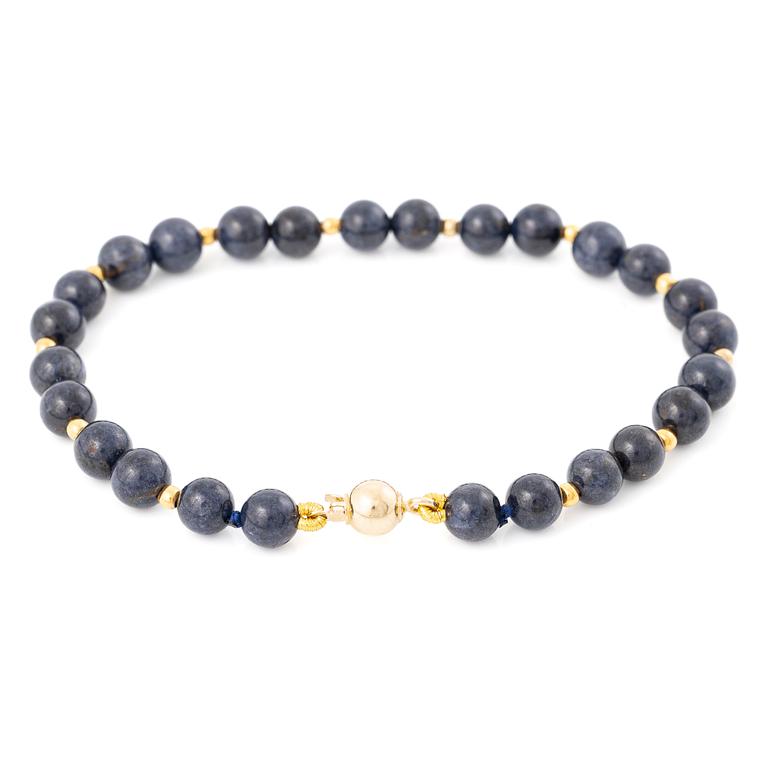 Bracelet with blue stones and 18K gold clasp.
