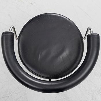 Charlotte Perriand, /Le Corbusier, swivel armchairs, a pair, model LC7, Cassina, Italy, later part of the 20th century.