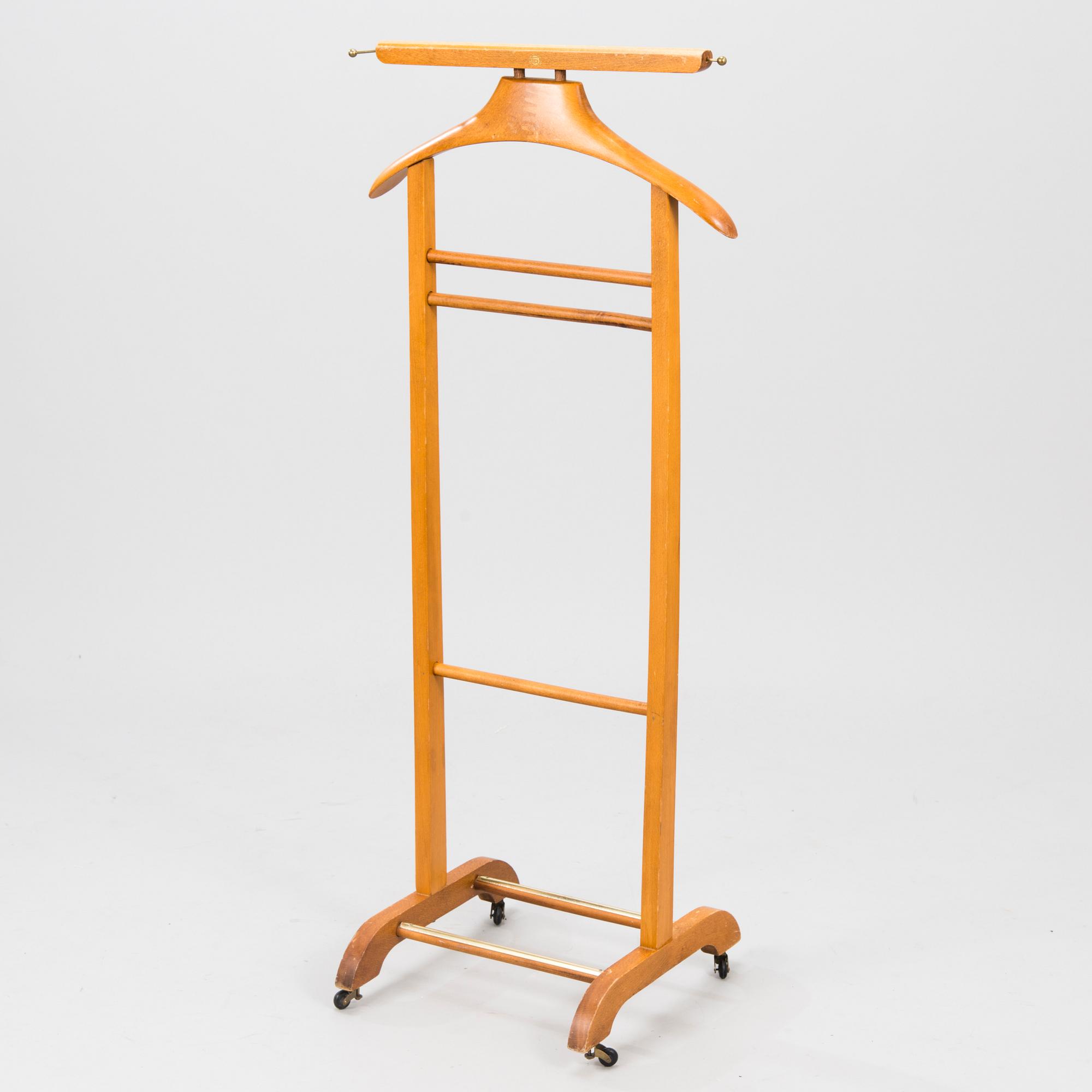 An Italian Fratelli Reguitti valet stand, the latter half of 20th century.