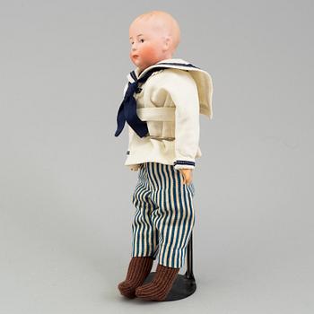 a German porcellain doll from the early 20th century.