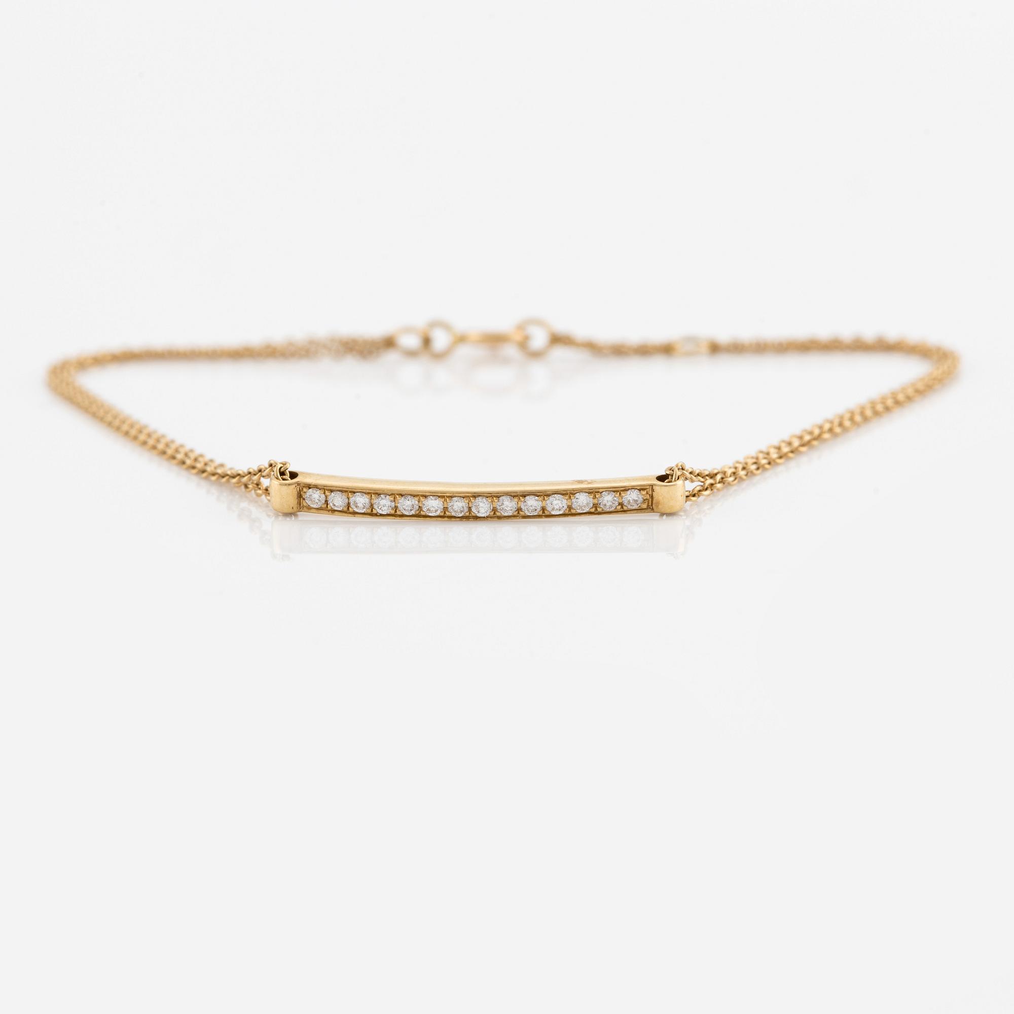 Armband, 18K guld med små briljantslipade diamanter.